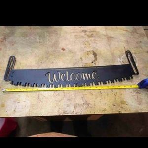 Welcome saw metal sign